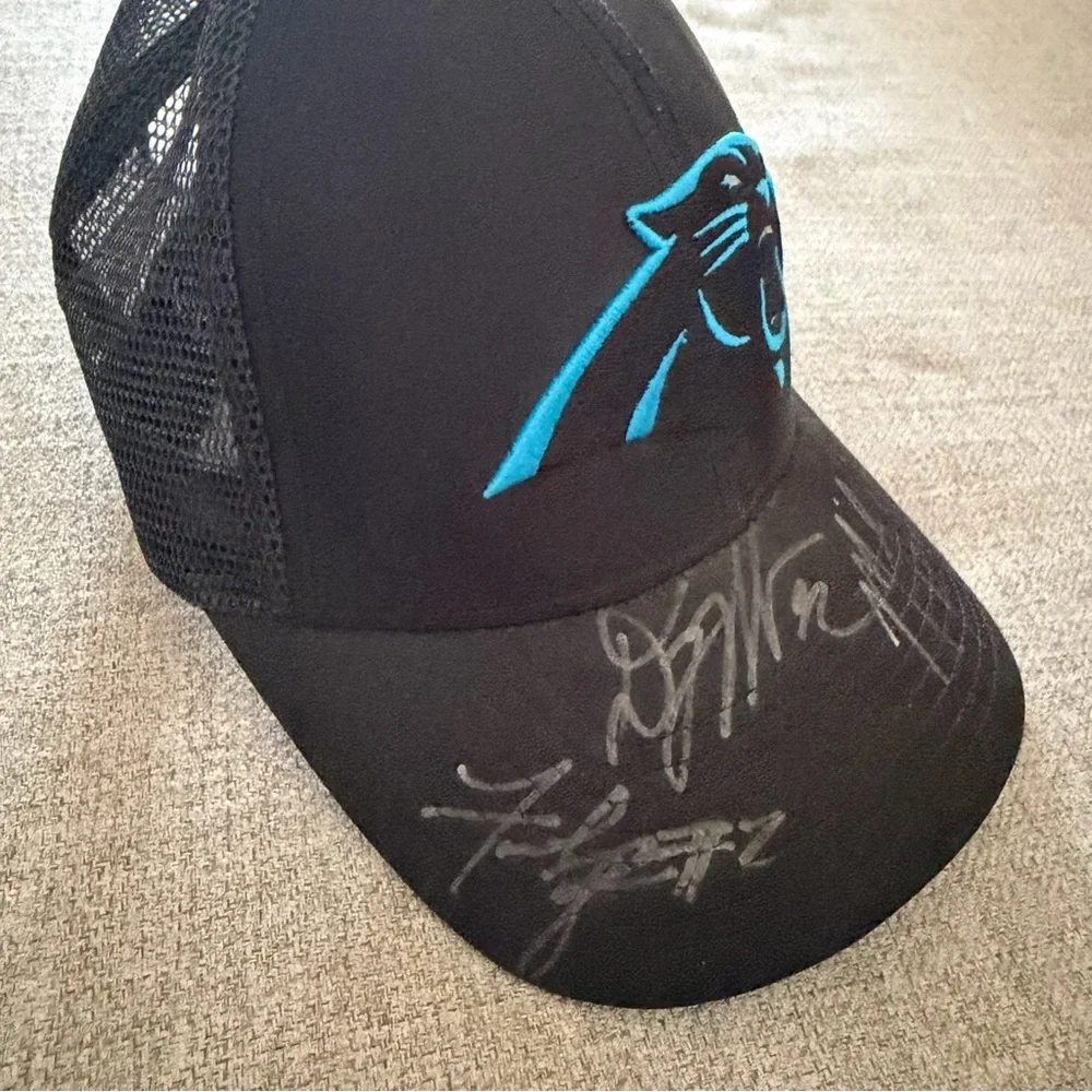 North Carolina NC Panthers Black Trucker Hat with Teal Logo 47 signed autograph